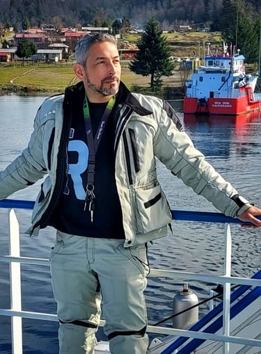 a man standing on a boat in the water